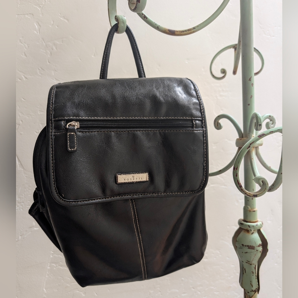Black Leather Backpack with Silver Hardware and Textured Finish